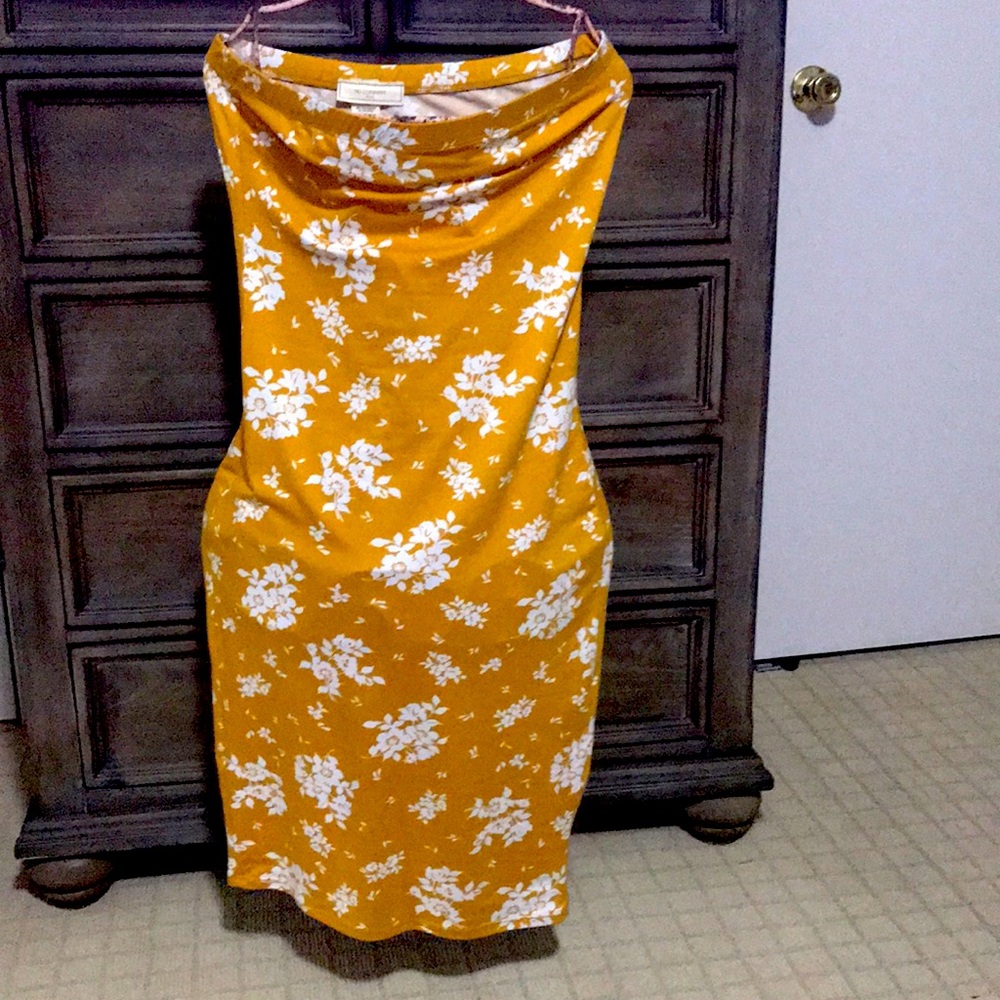Yellow dress with white flowers.